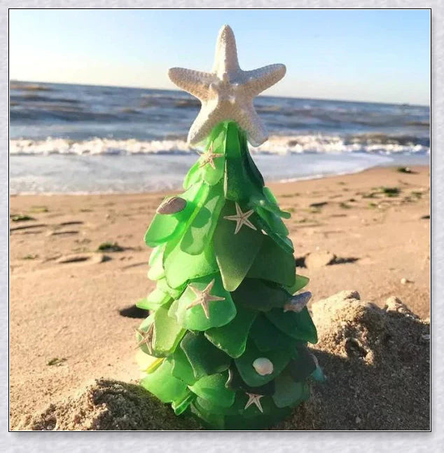 Handcrafted sea glass Christmas tree with blue, green, and turquoise sea glass, seashells, and starfish