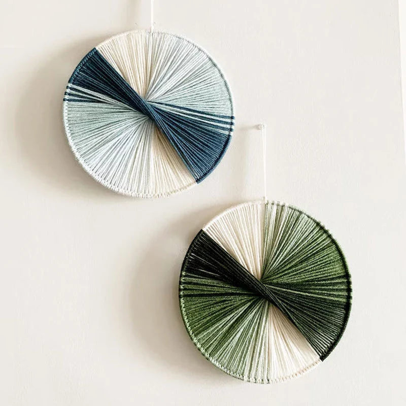 Colourful handmade macramé wall hanging with intricate patterns and vibrant colours, perfect for home decor