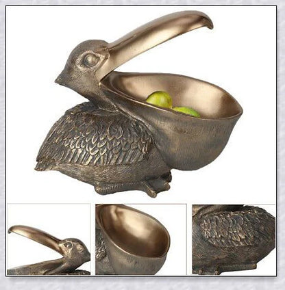 Pelican Storage Figurine, a high-quality resin sculpture with an open mouth design for practical storage and elegant décor.