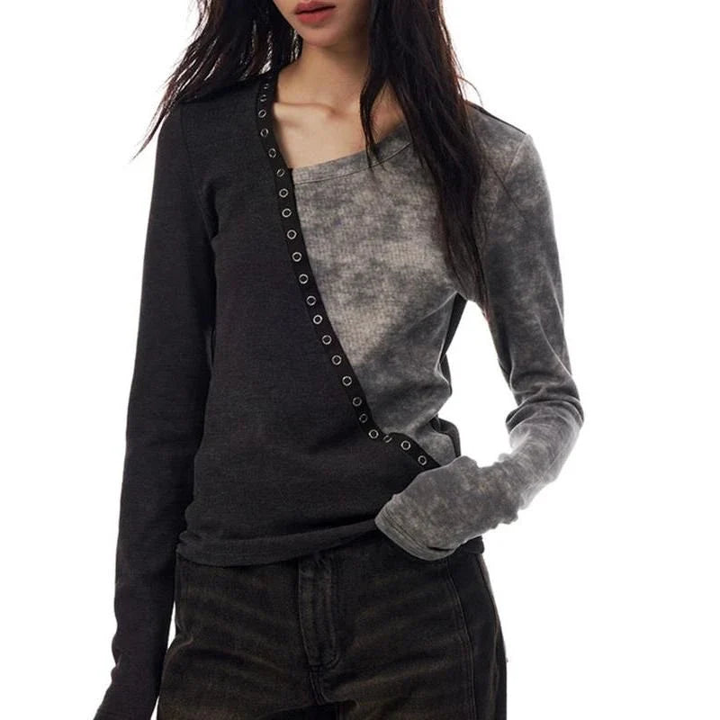 A cozy and stylish patchwork knitted pullover with an irregular V-neck design, perfect for autumn and winter wear.