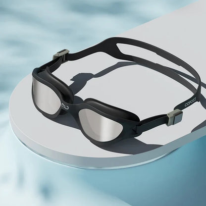 A pair of professional anti-fog mirrored swimming goggles with adjustable silicone strap and UV protection
