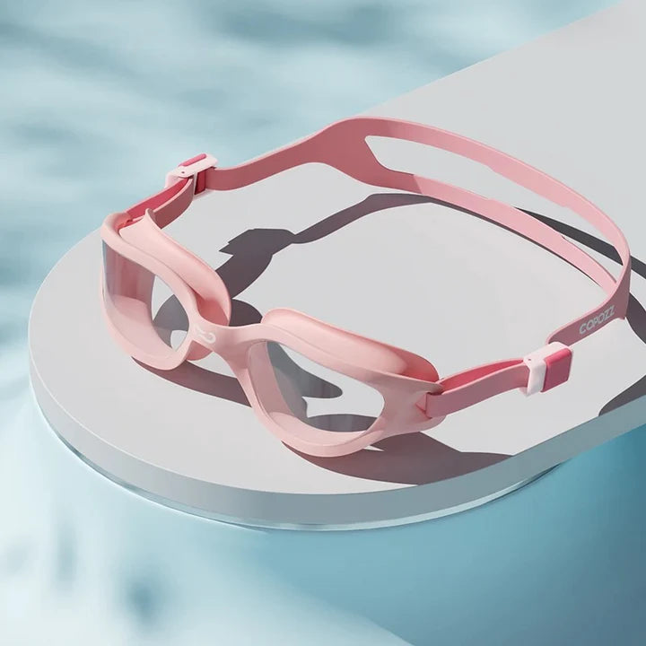 A pair of professional anti-fog mirrored swimming goggles with adjustable silicone strap and UV protection