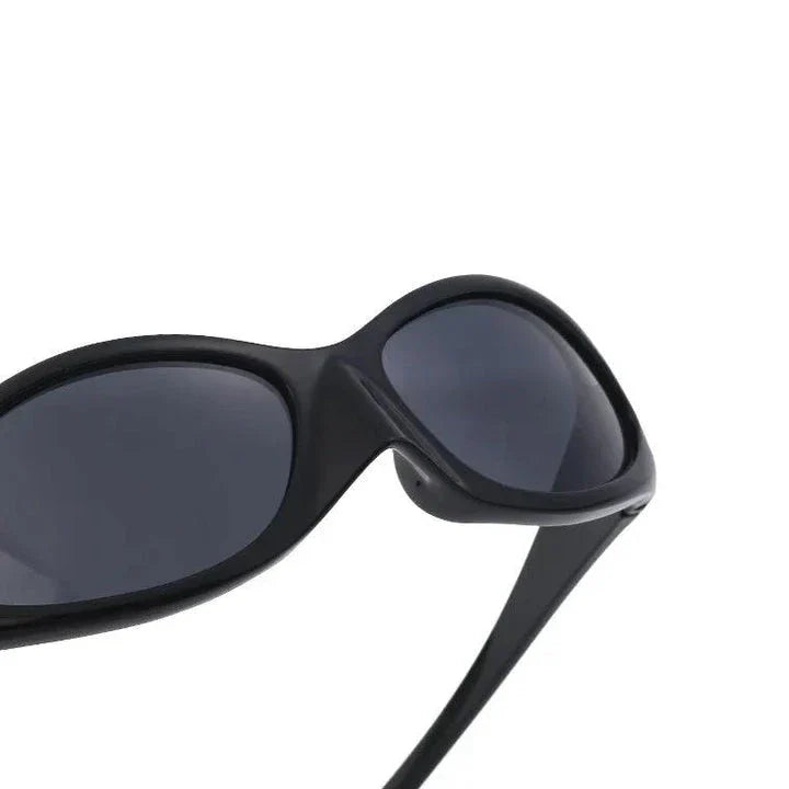 Oversized vintage luxury punk sunglasses with white and gray lenses, offering UV protection and stylish charm.