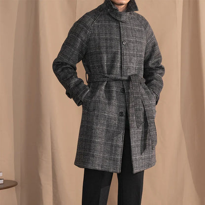 Men's wool-blend mid-length coat in a classic black grey colour, featuring a tailored silhouette and premium details for sophisticated winter style.