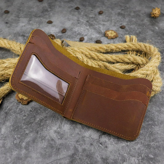A close-up view of a premium leather wallet in a light brown colour, featuring a single money clip and multiple card slots for organised storage of essentials.