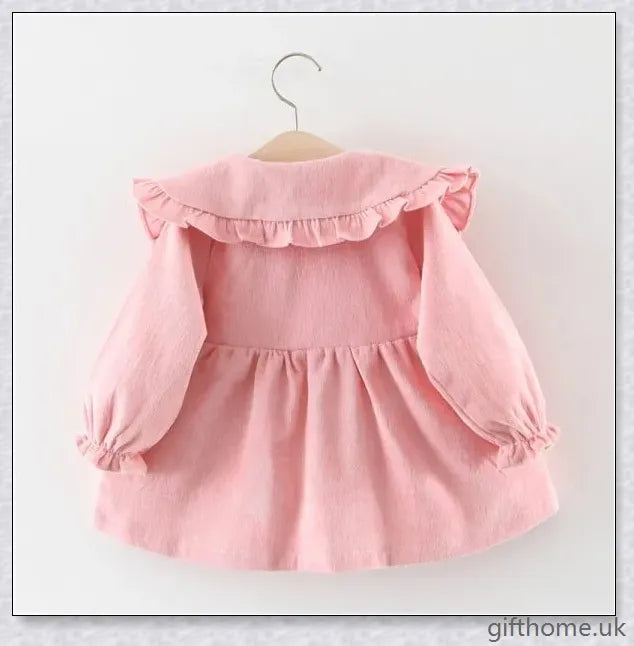 Soft, premium cotton baby girl dress with charming bow detail and cosy corduroy fabric