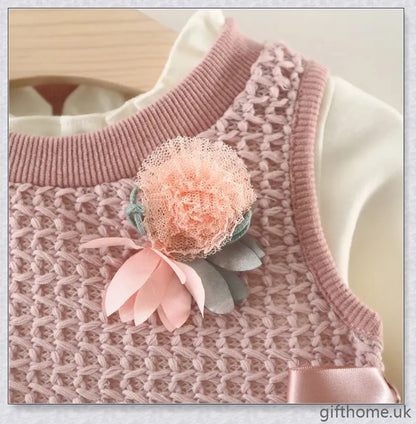 Soft, premium cotton baby girl dress with charming bow detail and cosy corduroy fabric