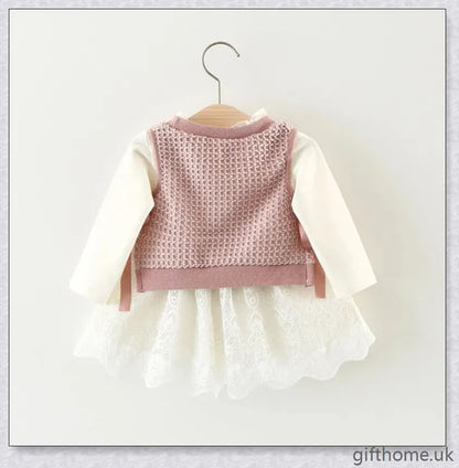 Soft, premium cotton baby girl dress with charming bow detail and cosy corduroy fabric
