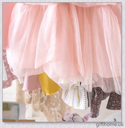 Soft, premium cotton baby girl dress with charming bow detail and cosy corduroy fabric