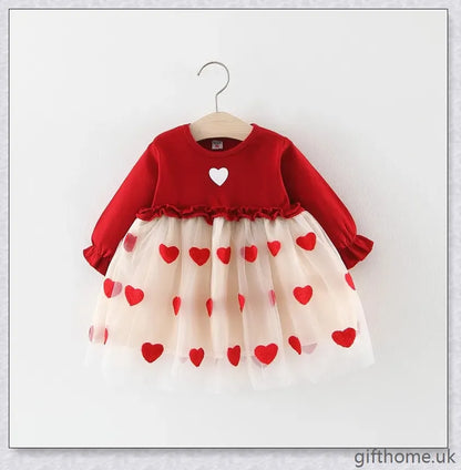 Soft, premium cotton baby girl dress with charming bow detail and cosy corduroy fabric