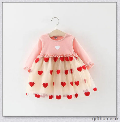 Soft, premium cotton baby girl dress with charming bow detail and cosy corduroy fabric