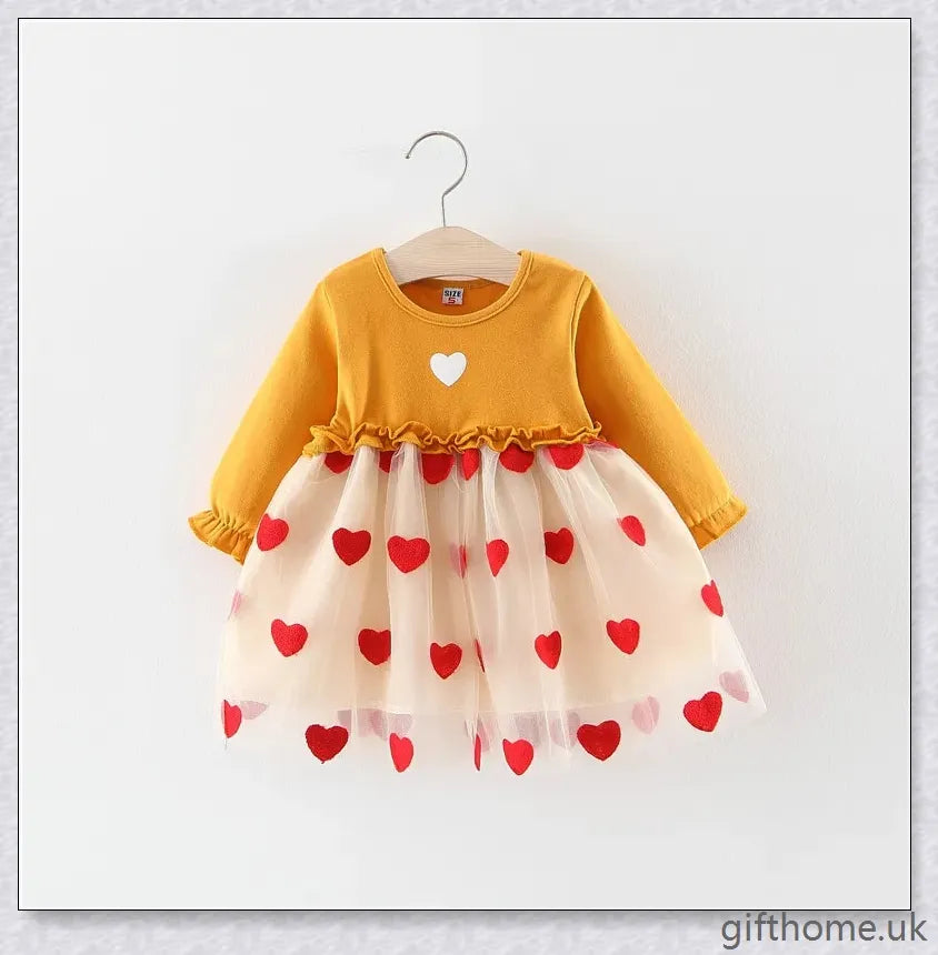 Soft, premium cotton baby girl dress with charming bow detail and cosy corduroy fabric