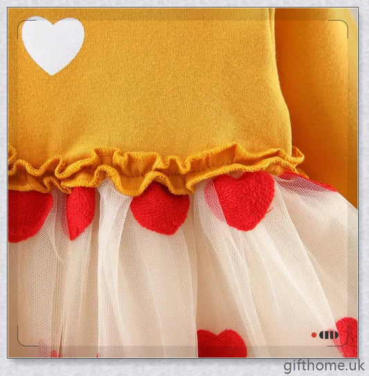 Soft, premium cotton baby girl dress with charming bow detail and cosy corduroy fabric