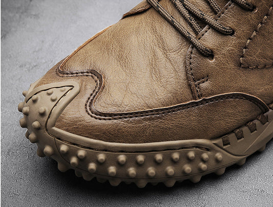 Stylish high-top leather boots in black, grey, and brown colours with a comfortable, breathable design
