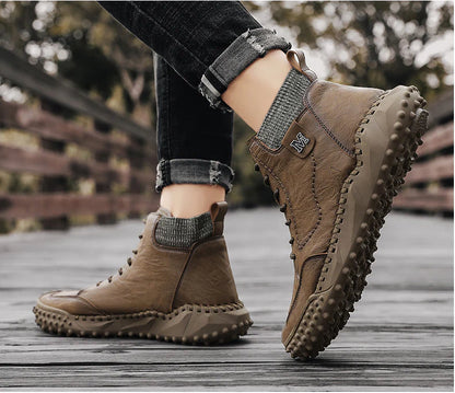 Stylish high-top leather boots in black, grey, and brown colours with a comfortable, breathable design