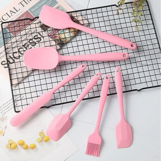 A set of 6 premium quality pink silicone baking tools, including spatulas, whisks, and other essential baking accessories