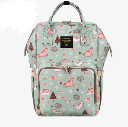 Multi-purpose large capacity mummy bag in blue, with a sleek backpack-inspired design and ample storage for parenting essentials