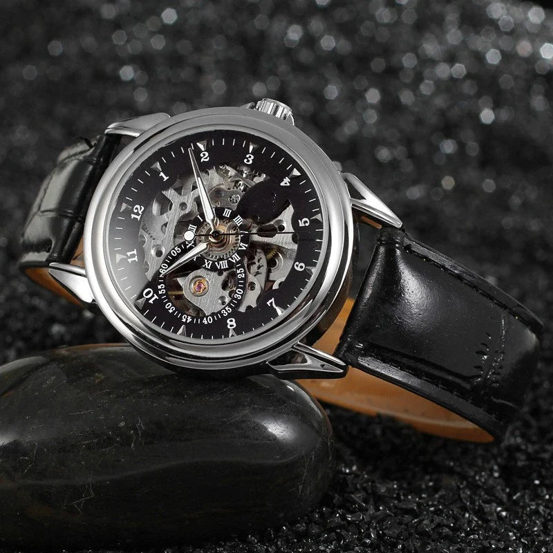 Hollow Automatic Mechanical Watch with stainless steel case, transparent case back, and elegant design