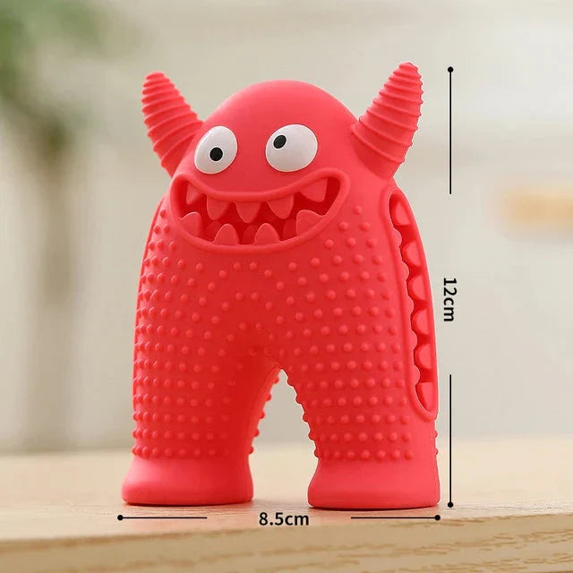 A cute interactive silicone dog toy shaped like a little monster, designed to clean teeth and promote dental health while providing entertainment.