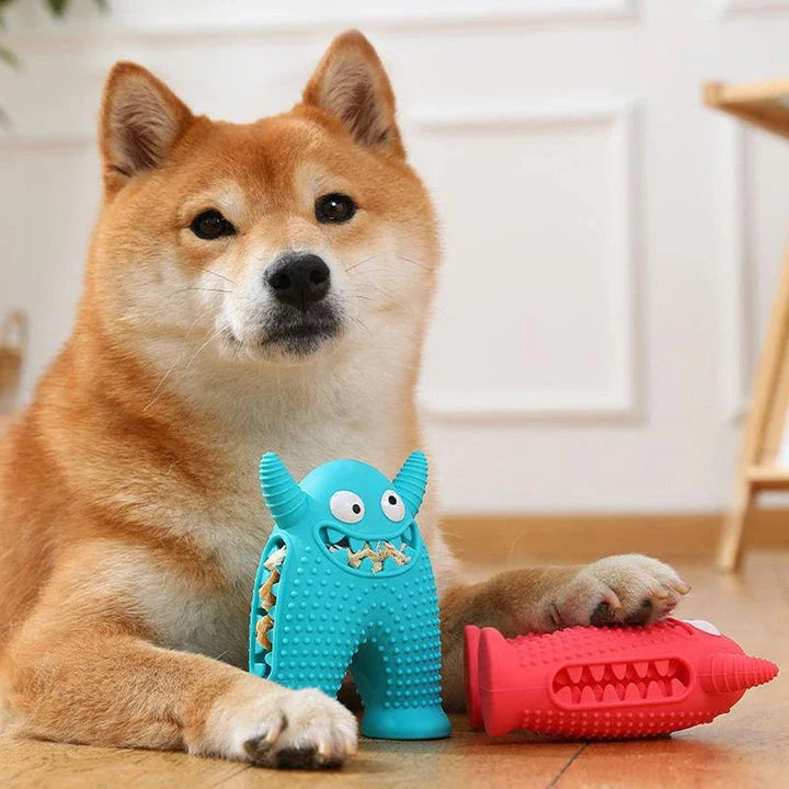 A cute interactive silicone dog toy shaped like a little monster, designed to clean teeth and promote dental health while providing entertainment.