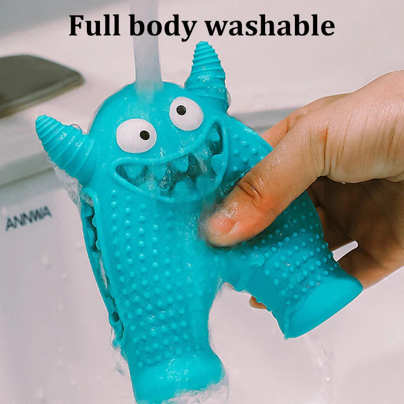 A cute interactive silicone dog toy shaped like a little monster, designed to clean teeth and promote dental health while providing entertainment.