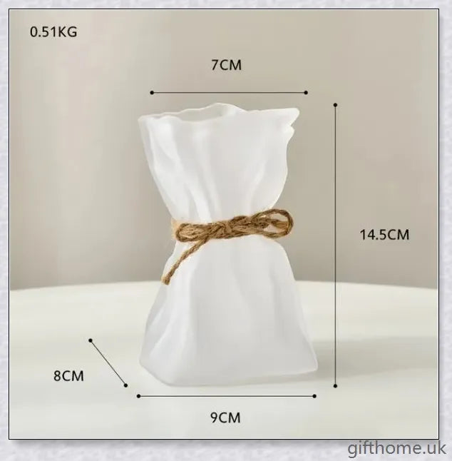 Premium glass vase with a mesmerising swirl pattern, perfect for displaying dried flower arrangements