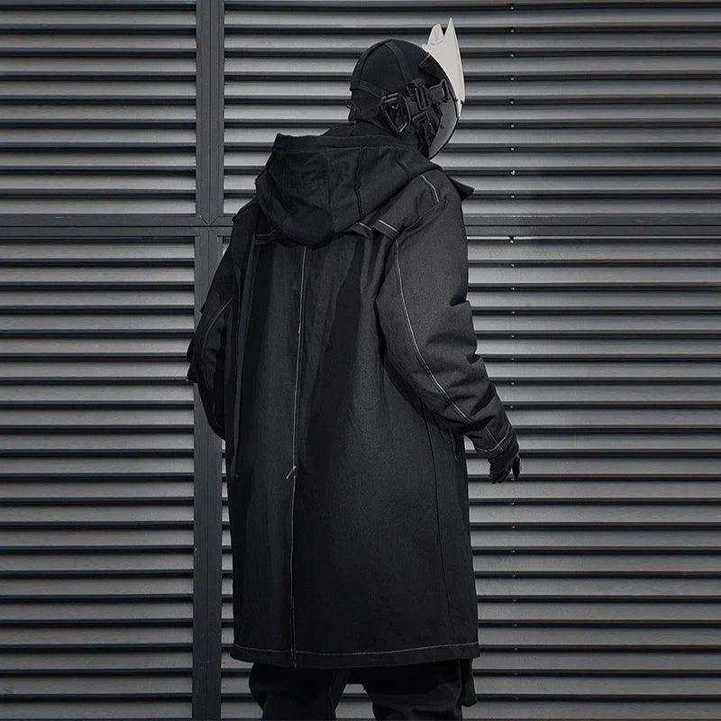 Irregular Trench Coat in black, featuring a mid-length silhouette, zip-up closure, and hooded design for modern British style.
