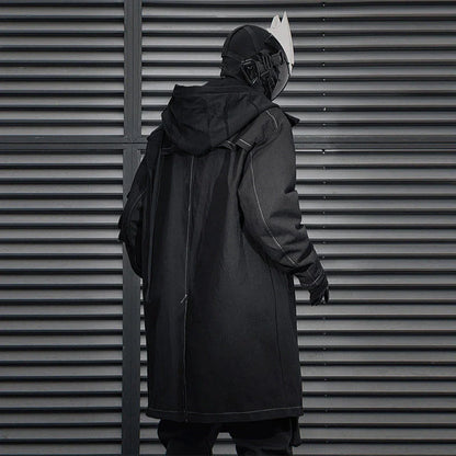 Irregular Trench Coat in black, featuring a mid-length silhouette, zip-up closure, and hooded design for modern British style.