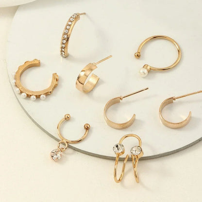 8 Piece Gold-Toned Pearl Stud Earring Set with Eccentric Design and Variety of Shapes