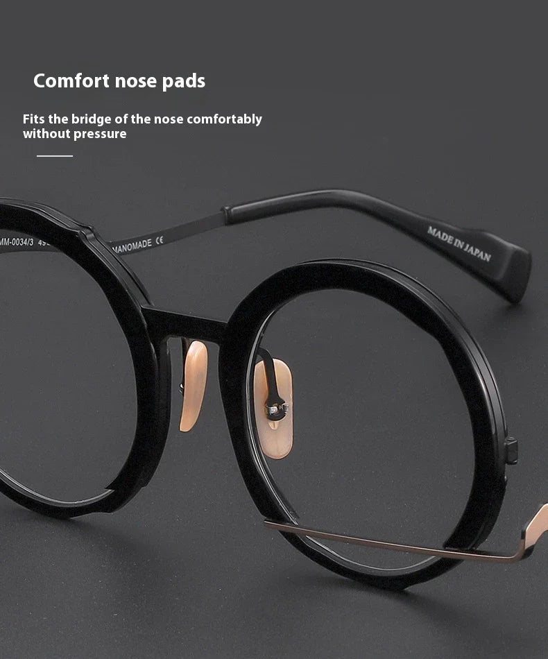A close-up view of a premium fashion metal spectacle frame in black, white gold, and black gold colours.