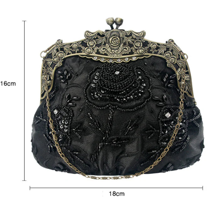 Elegant black bead embroidered cosmetic bag with a vintage-inspired design