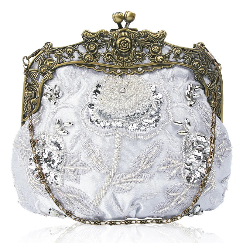 Elegant black bead embroidered cosmetic bag with a vintage-inspired design
