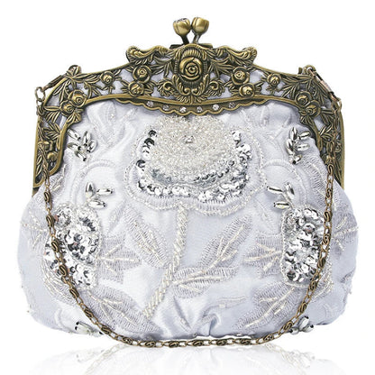 Elegant black bead embroidered cosmetic bag with a vintage-inspired design