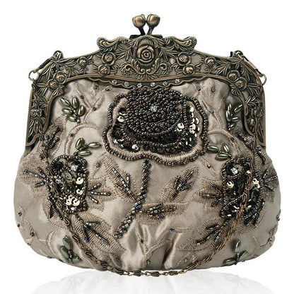 Elegant black bead embroidered cosmetic bag with a vintage-inspired design