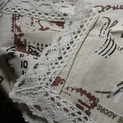 A decorative Paris-themed cotton and linen tablecloth featuring iconic landmarks and a romantic French design