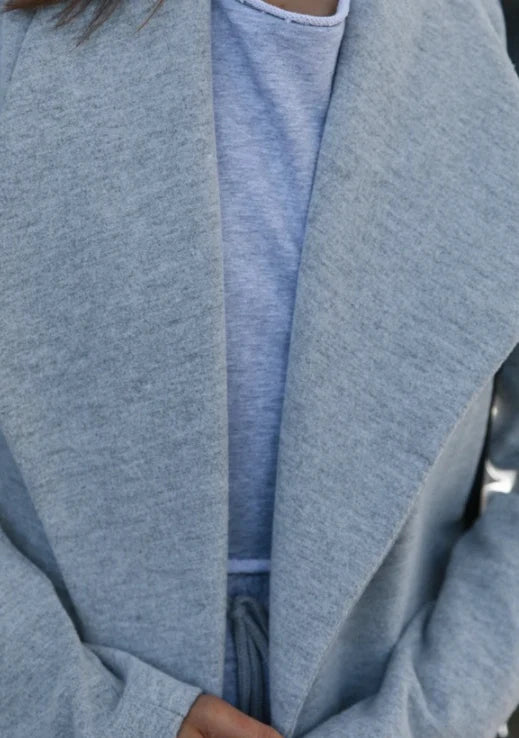 Premium polyester fibre trench coat in solid grey or black colour, with a timeless silhouette and flattering fit