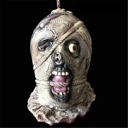 Chilling Halloween Secret Room Decapitation Decoration Horror Props with voice-activated sensor, red LED eyes, and swaying severed arm