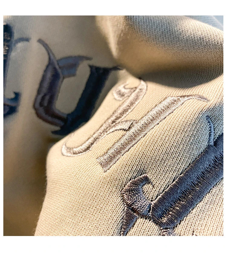 Retro American-inspired sweater cardigan in dark grey, featuring a relaxed, classic silhouette for versatile layering and all-day comfort.