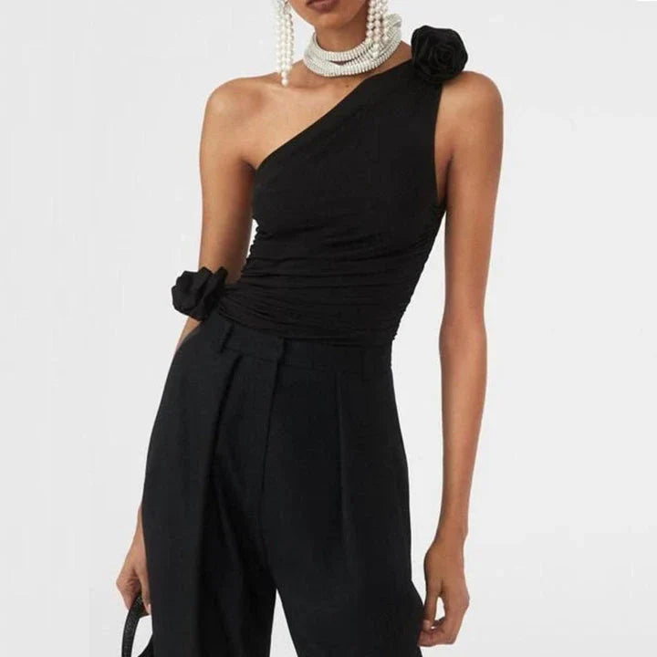 Chic black diagonal shoulder knit tank top with 3D rose detail, perfect for summer fashion