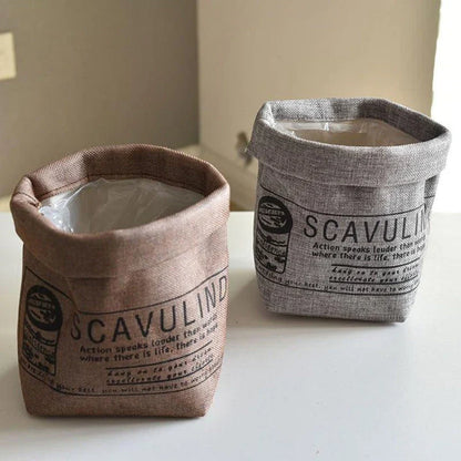 Cream white fabric flower pot cover and storage bag with a neat, upright shape and handmade details
