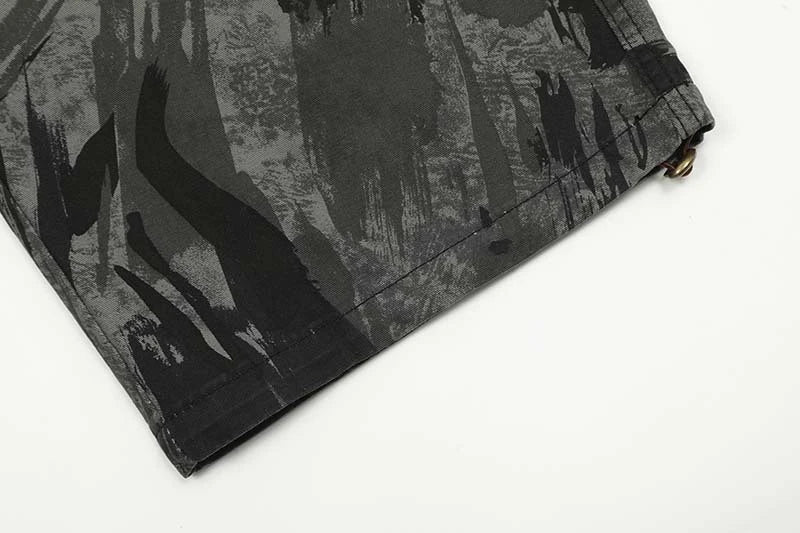 Graffiti-inspired camouflage print straight jeans for fashionable men and women