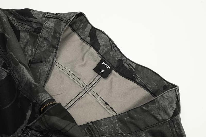 Graffiti-inspired camouflage print straight jeans for fashionable men and women