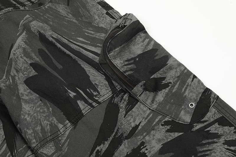 Graffiti-inspired camouflage print straight jeans for fashionable men and women