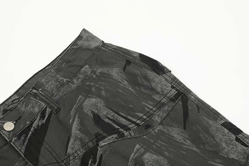 Graffiti-inspired camouflage print straight jeans for fashionable men and women