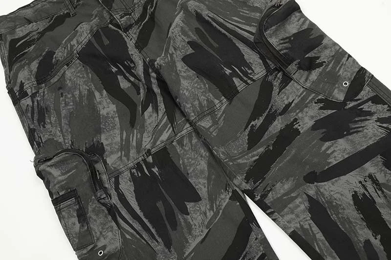 Graffiti-inspired camouflage print straight jeans for fashionable men and women