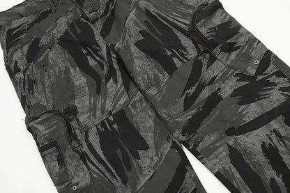 Graffiti-inspired camouflage print straight jeans for fashionable men and women