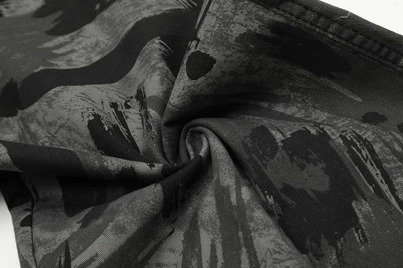 Graffiti-inspired camouflage print straight jeans for fashionable men and women