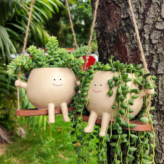 Flower Pot Wall Planter Swing Face with a charming face-shaped design for adding unique personality to your home or garden