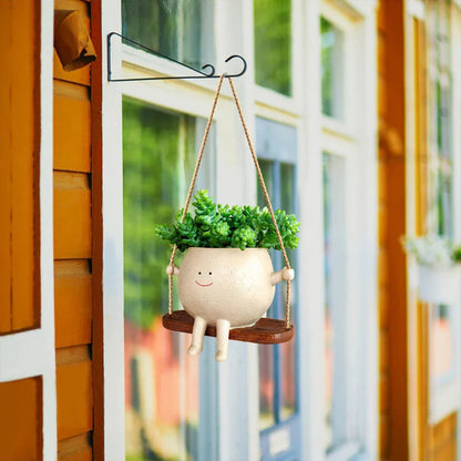 Flower Pot Wall Planter Swing Face with a charming face-shaped design for adding unique personality to your home or garden