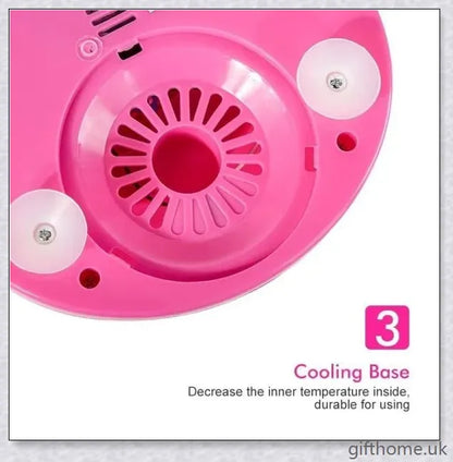 A red cotton candy maker machine on a counter, creating fluffy, cloud-like cotton candy.